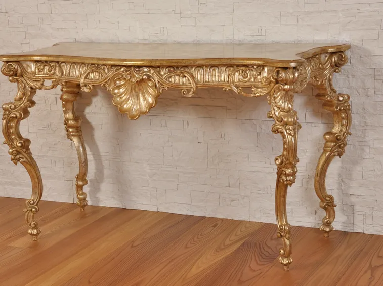 finiture in foglie d'oro e argento