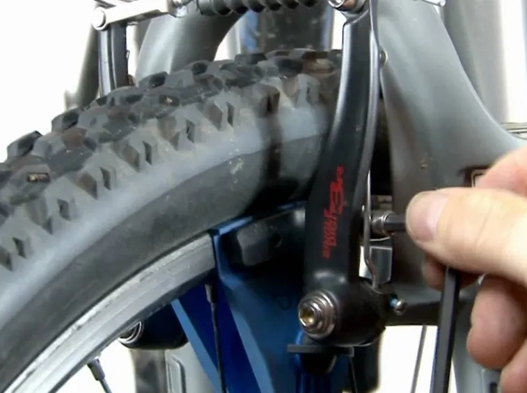 regolazione pattini freno bici